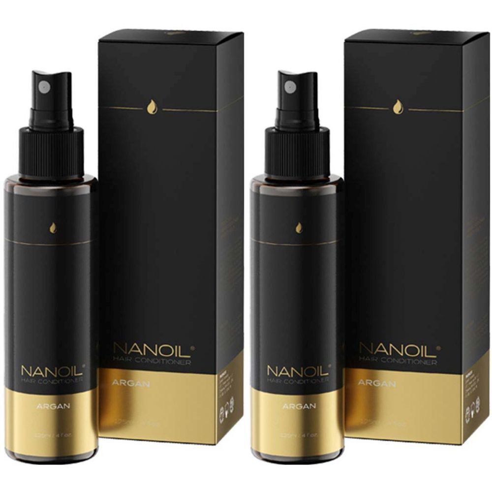 Zwei Flaschen mit Sprühkopf und schwarzer Verpackung. Aufschrift: NANOIL, Haarspülung, Argan. Goldfarbene Akzente.