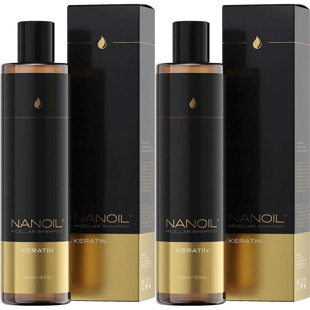 Zwei Flaschen und zwei Schachteln NANOIL Keratin Micellar Shampoo. Schwarze Flaschen mit goldenen Akzenten und Logo. Schwarze Schachteln.