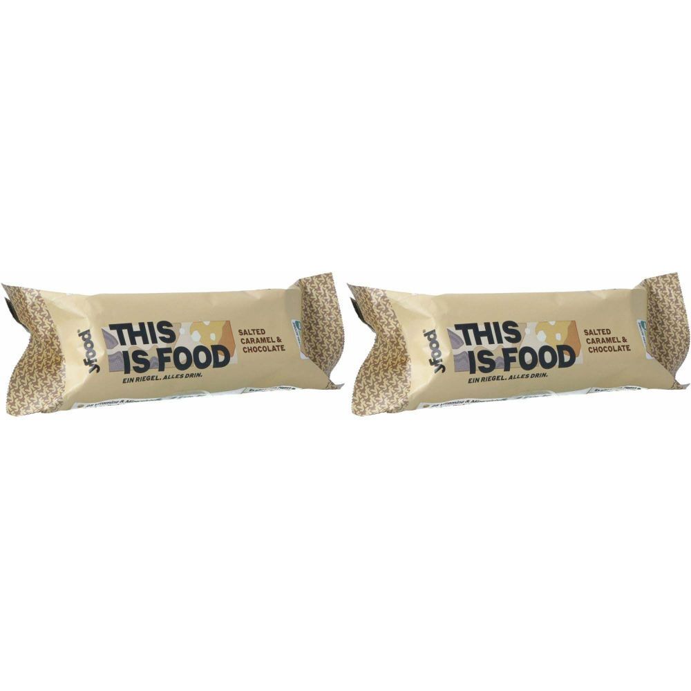 Zwei Riegel in Papierverpackung. Aufschrift: THIS IS FOOD, Salted Caramel & Chocolate. Marke yfood.