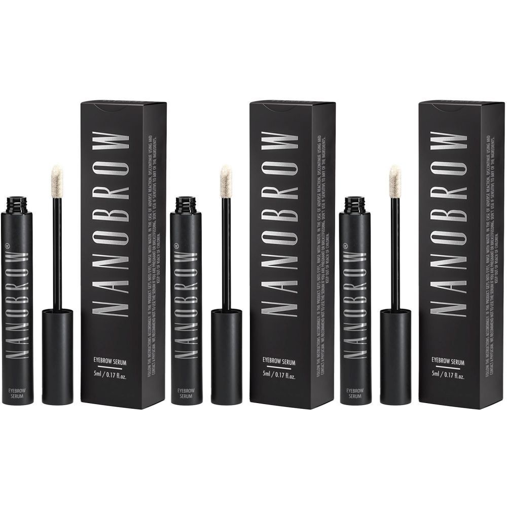 Drei schwarze Flaschen mit Bürsten und Verpackungen. Auf den Verpackungen steht "NANOBROW AUGENBRAUENSERUM".