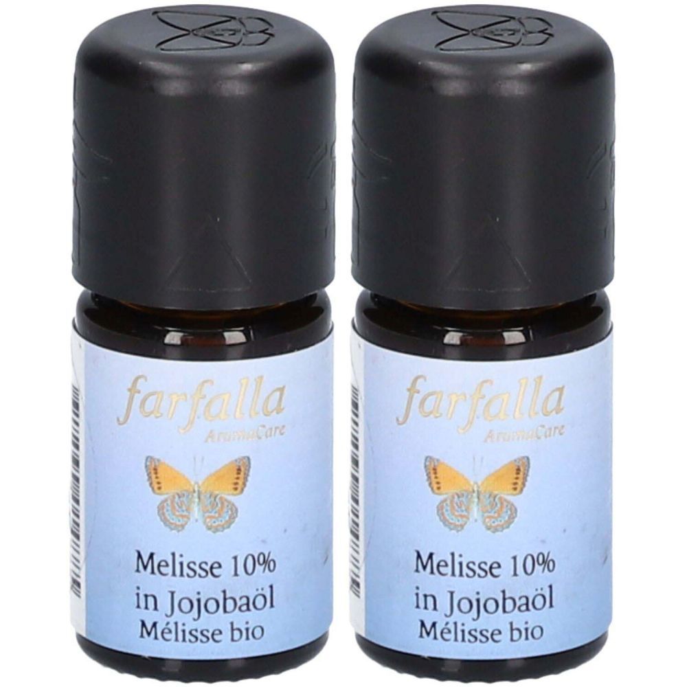 Zwei kleine braune Glasflaschen mit schwarzen Deckeln. Auf den Etiketten steht "farfalla" und "Melisse 10% in Jojobaöl".