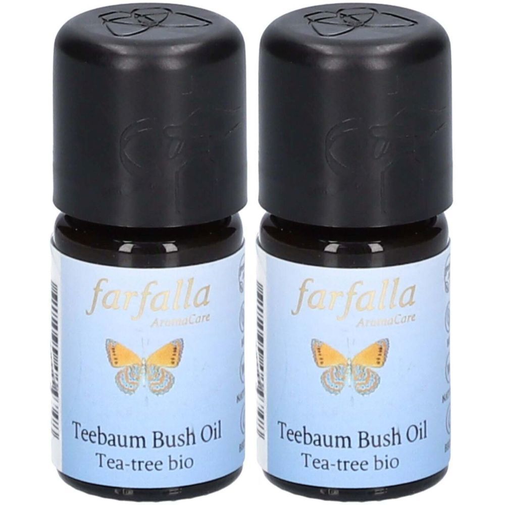Zwei kleine braune Flaschen mit schwarzem Deckel. Auf dem Etikett steht "farfalla" und "Teebaum Bush Oil".
