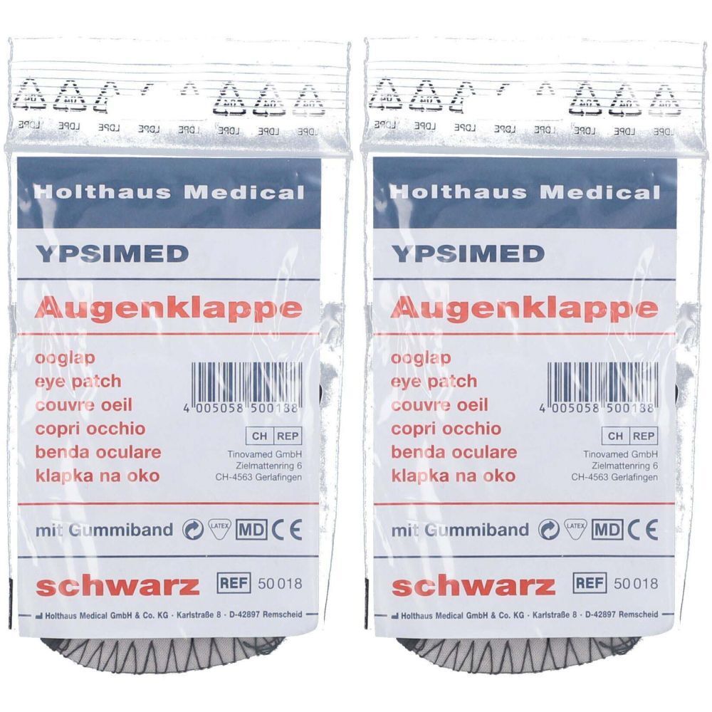 Zwei Augenklappen in Folienverpackung. Aufschrift: YPSIMED Augenklappe, mit Gummiband, schwarz. Medizinprodukt.