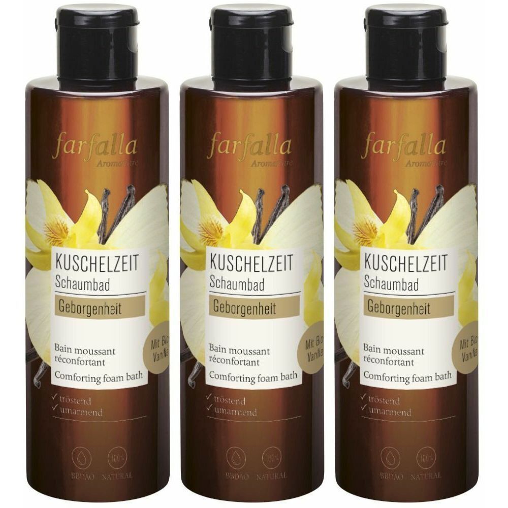 Drei Flaschen Schaumbad mit schwarzem Deckel. Aufschrift: KUSCHELZEIT Schaumbad Geborgenheit. Mit Vanille- und Blüten-Design.