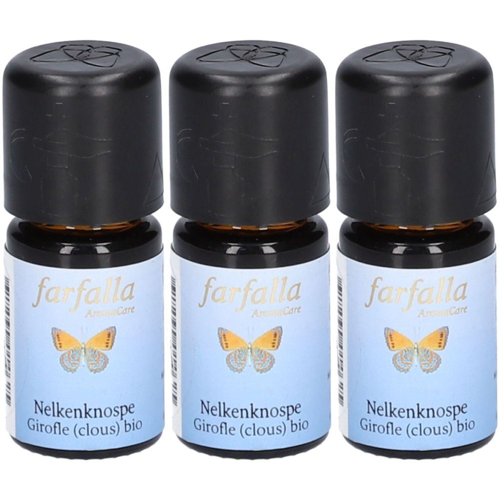 Drei kleine braune Glasflaschen mit schwarzen Deckeln. Auf den Etiketten steht "farfalla", "Nelkenknospe Girofle (clous) bio" und ein Schmetterling.