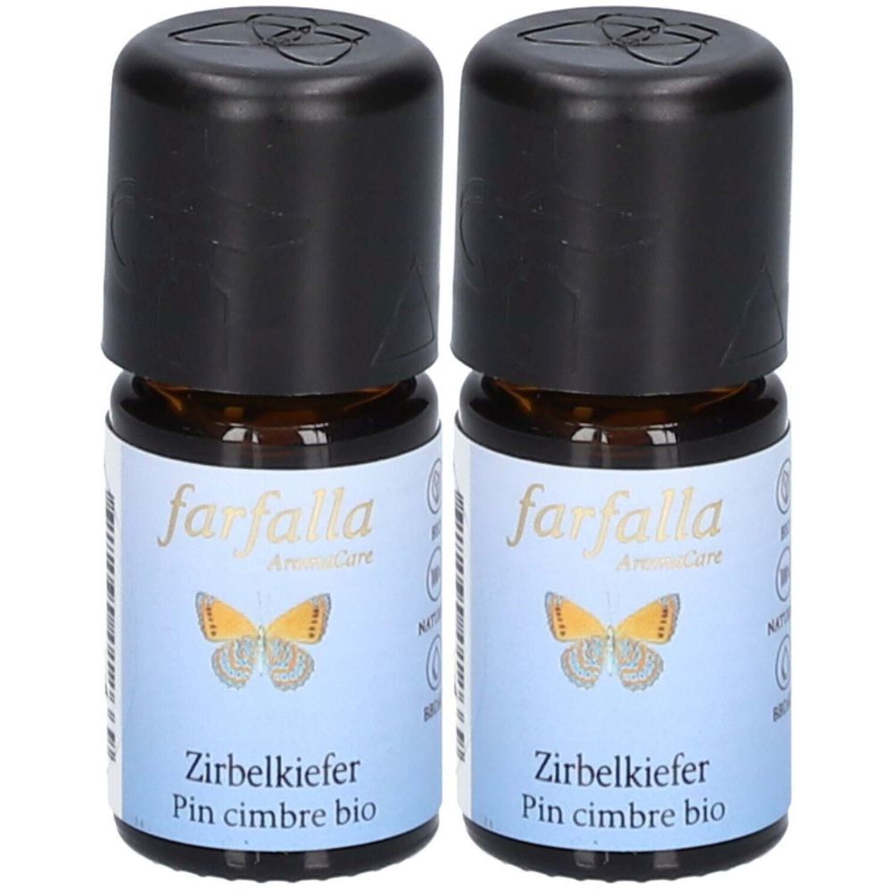 Zwei kleine braune Glasflaschen mit schwarzen Deckeln. Auf den Etiketten steht "farfalla" und "Zirbelkiefer".