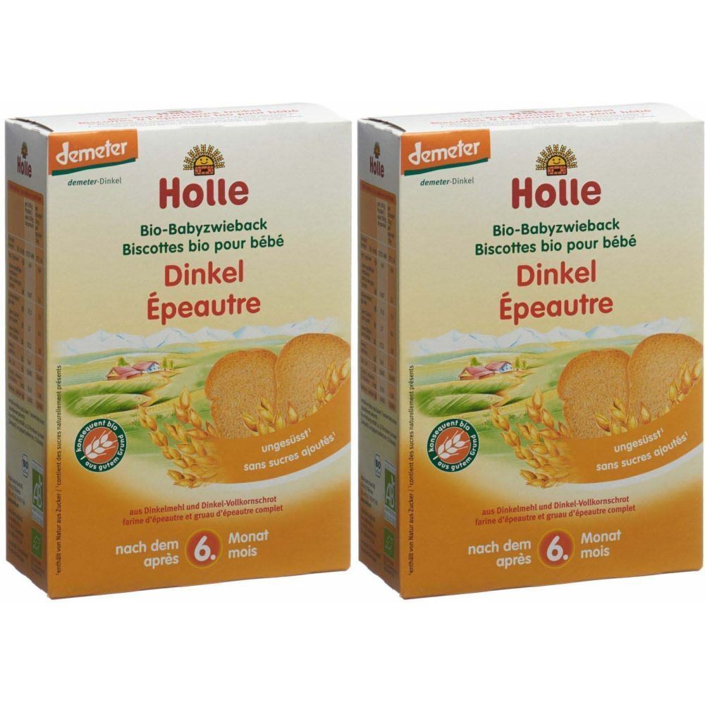 Deux boîtes de Holle Bio-Babyzwieback Dinkel. Inscription : Bio-Babyzwieback, Dinkel, à partir du 6e mois. Label Demeter.