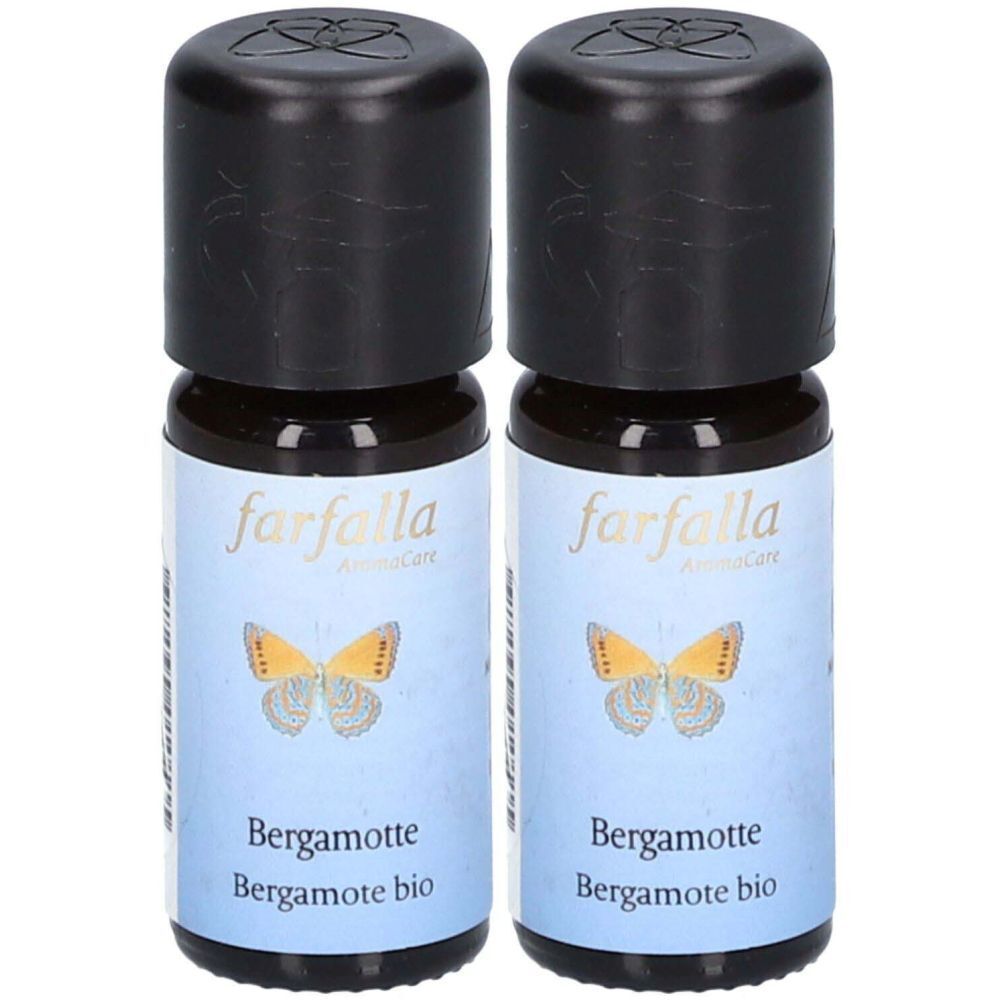Zwei kleine Glasflaschen mit schwarzem Deckel. Auf dem Etikett steht "farfalla" und "Bergamotte bio".