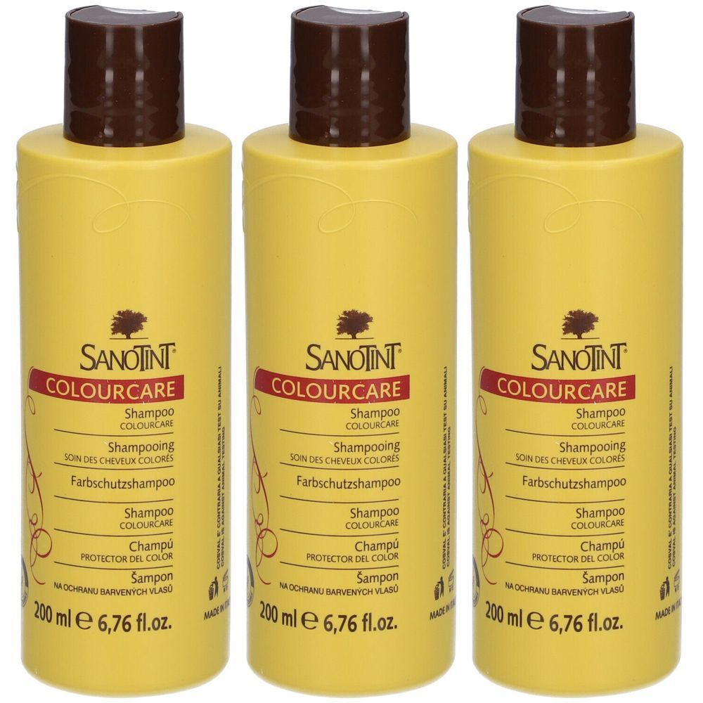 Trois flacons de shampooing jaunes avec des bouchons marron. Inscription : SANOTINT COLOURCARE Shampooing.