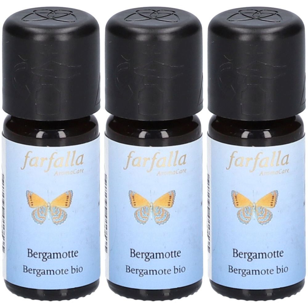 Drei kleine Glasflaschen mit schwarzem Deckel. Auf den Etiketten steht "farfalla", ein Schmetterling und "Bergamotte bio".