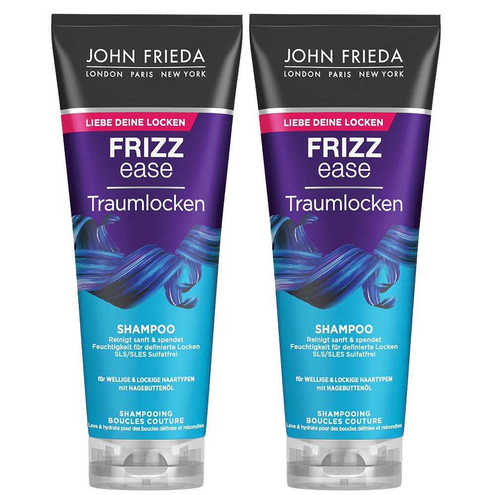 Zwei Shampooflaschen. Schwarzer Deckel, lila-blauer Körper mit Text. Marke: John Frieda Frizz Ease Traumlocken Shampoo.