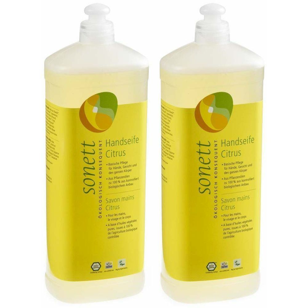 Zwei Flaschen Flüssigseife mit gelbem Etikett. Aufschrift: Handseife Citrus, sonett. Mit Dosierkopf.