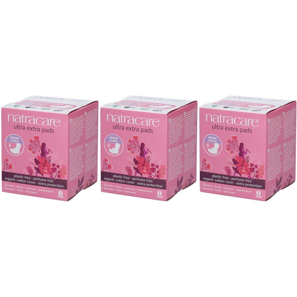 Trois boîtes roses "natracare ultra extra pads". Inscription : sans plastique, sans parfum, revêtement en coton bio, protection extra.