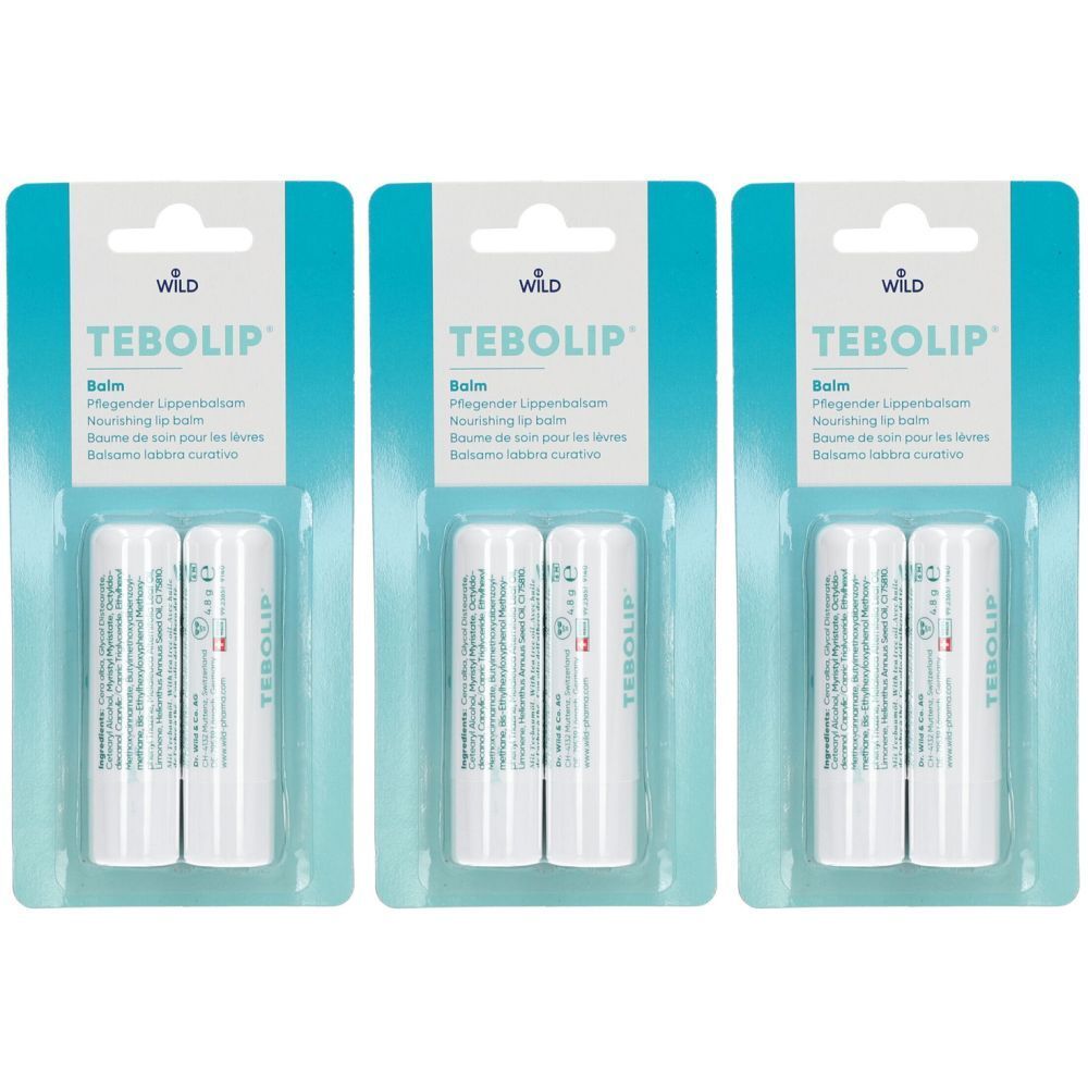 Drie verpakkingen TEBOLIP Balm Duo. Elke verpakking bevat twee witte lippenbalsemstiften. Op de verpakking staat "TEBOLIP" en "Balm".