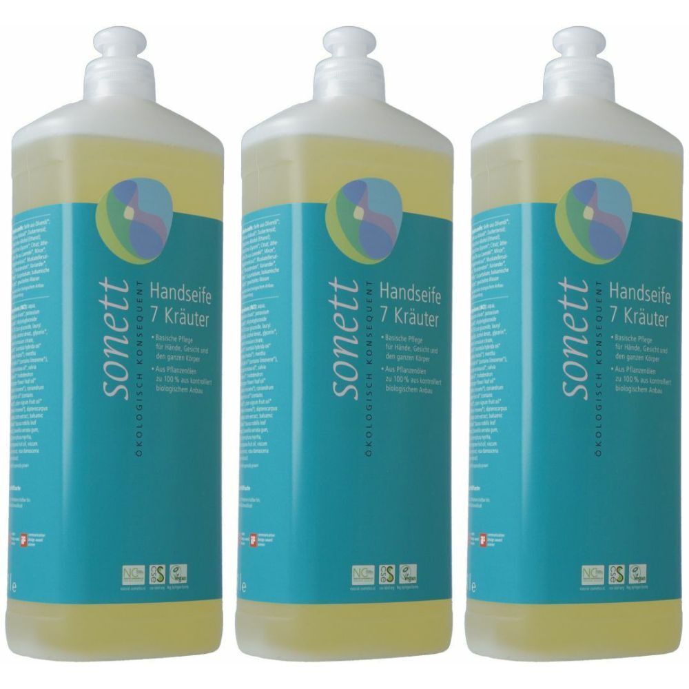 Drie flessen vloeibare zeep. Turquoise etiketten met productnaam en logo. Witte pompknoppen bovenop.