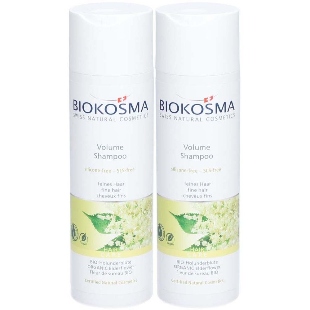 Zwei weiße Shampoo-Flaschen mit grünen und gelben Etiketten. Aufschrift: BIOKOSMA, Volume Shampoo, für feines Haar. Zertifiziertes Naturkosmetik.