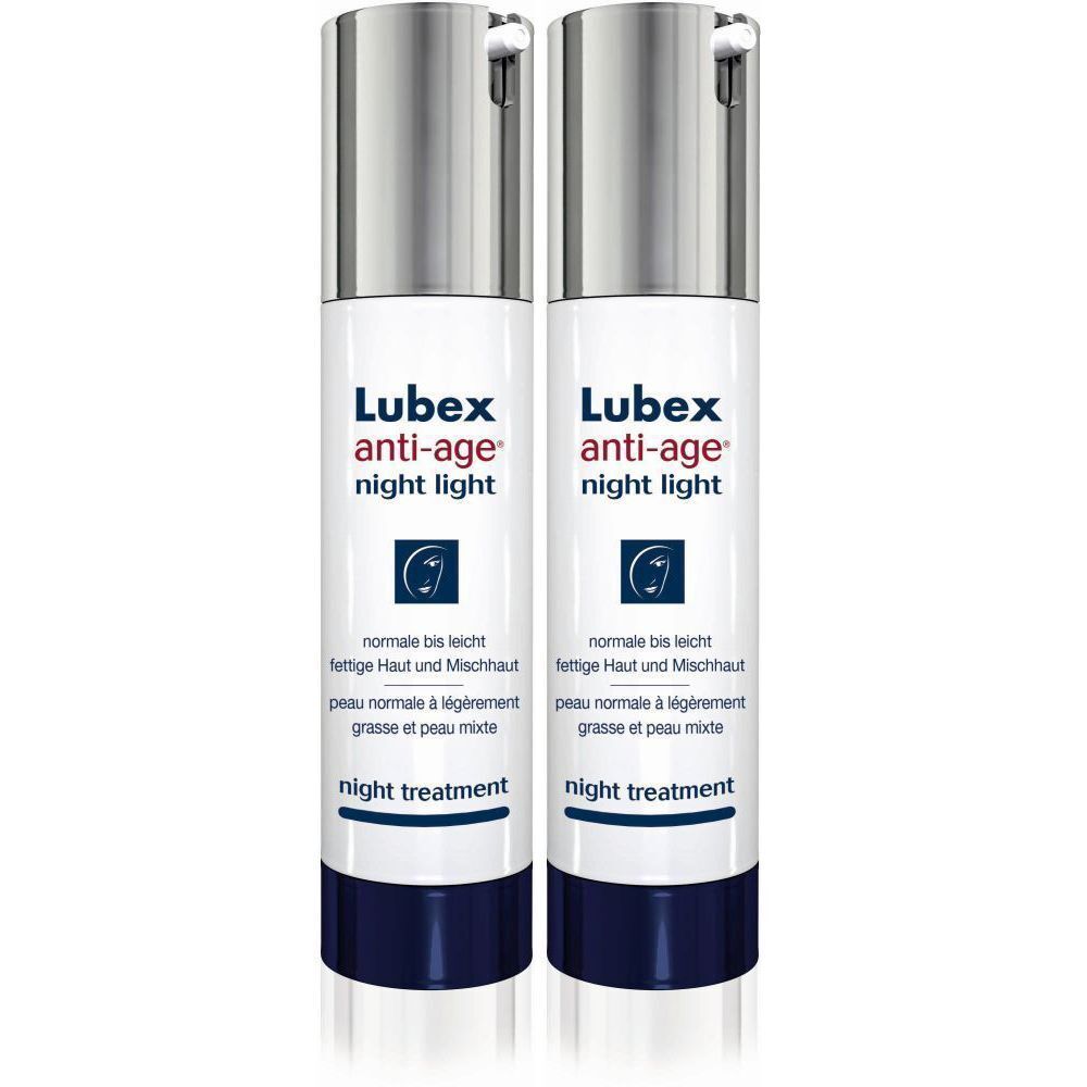 Deux flacons de LUBEX Anti-âge® Night Light. Flacons blancs avec bouchons argentés et bases bleues. Texte : Anti-âge, night light, night treatment.