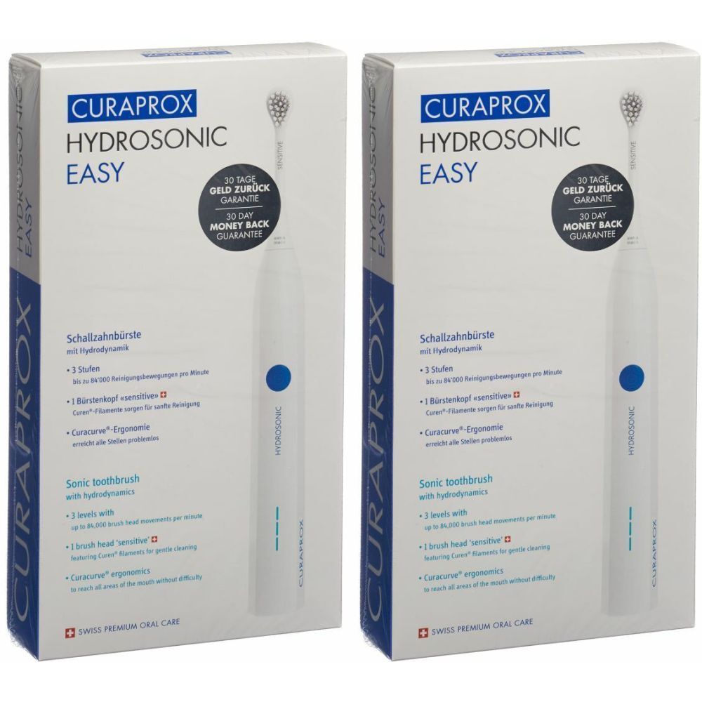 Zwei weiße Zahnbürsten-Sets. Auf der Verpackung steht CURAPROX HYDROSONIC EASY. Mit Garantie-Hinweis.