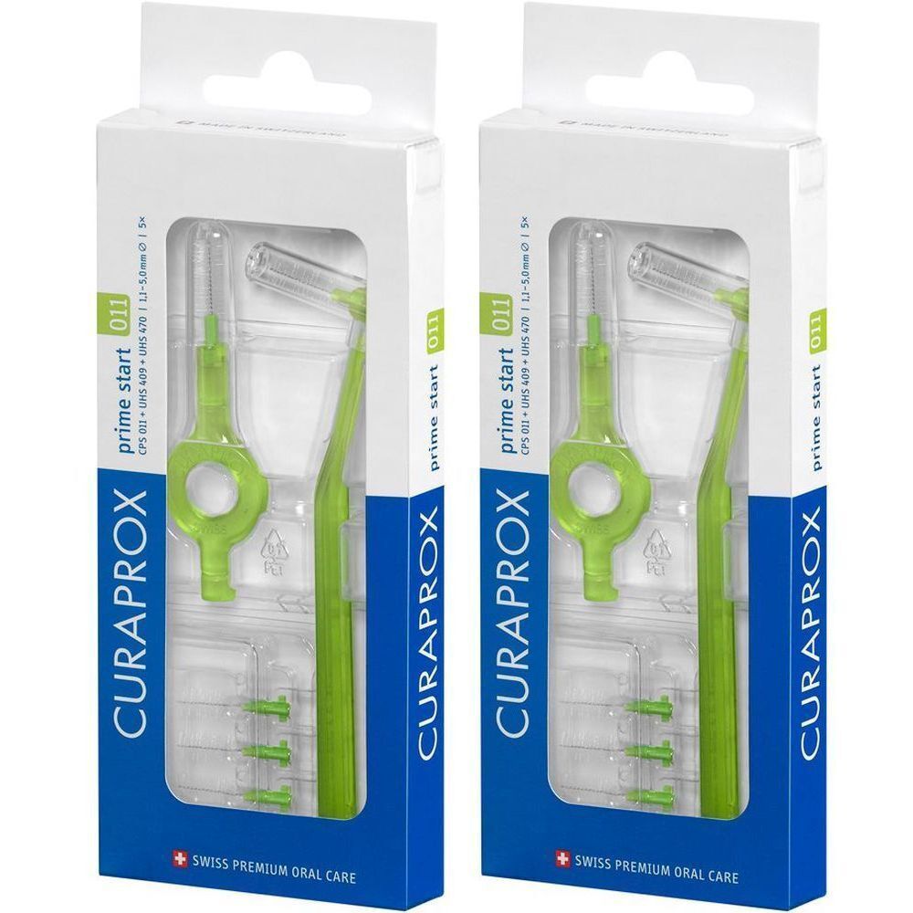 Zwei Packungen mit grünen Interdentalbürsten. Verpackung mit Produktnamen CURAPROX und Produktbezeichnung prime start 011.