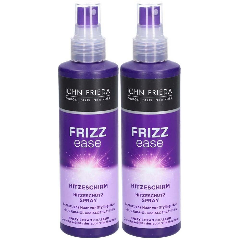 Deux flacons violets avec vaporisateur. Inscription: JOHN FRIEDA FRIZZ ease Hitzeschirm Hitzeschutz Spray. 