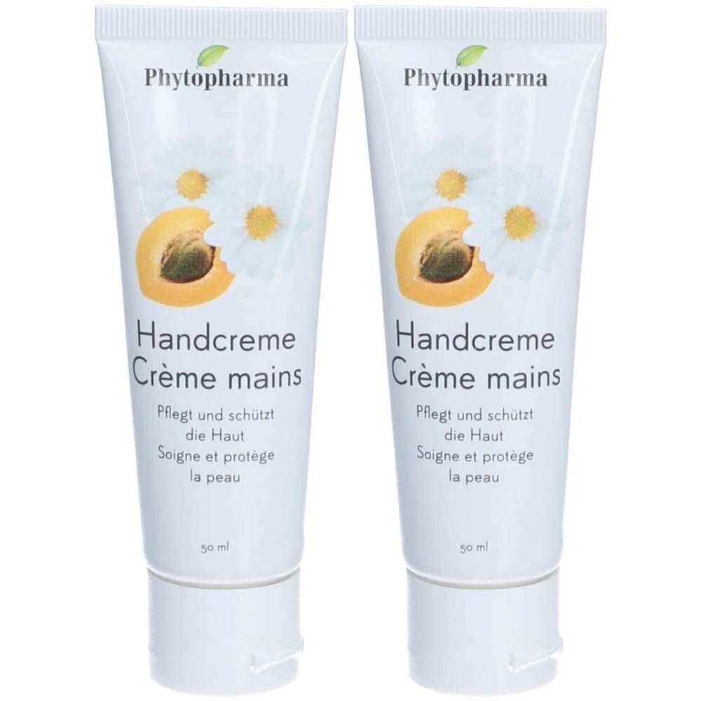Zwei Tuben Handcreme. Aufschrift: Phytopharma, Handcreme, Crème mains. Mit Illustrationen von Blüten und einer Aprikose. Weiße Tuben mit weißem Deckel.