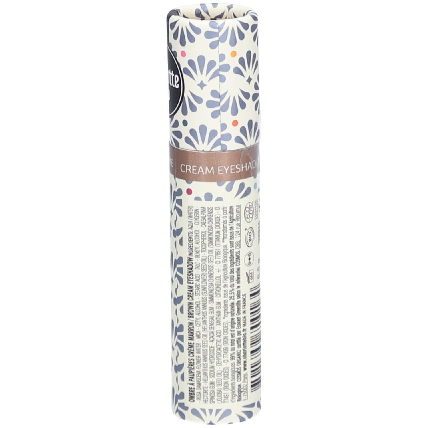 Emballage cylindrique à motifs floraux. Logo Charlotte Bio. Texte: CREAM EYESHADOW. Informations produit et ingrédients.
