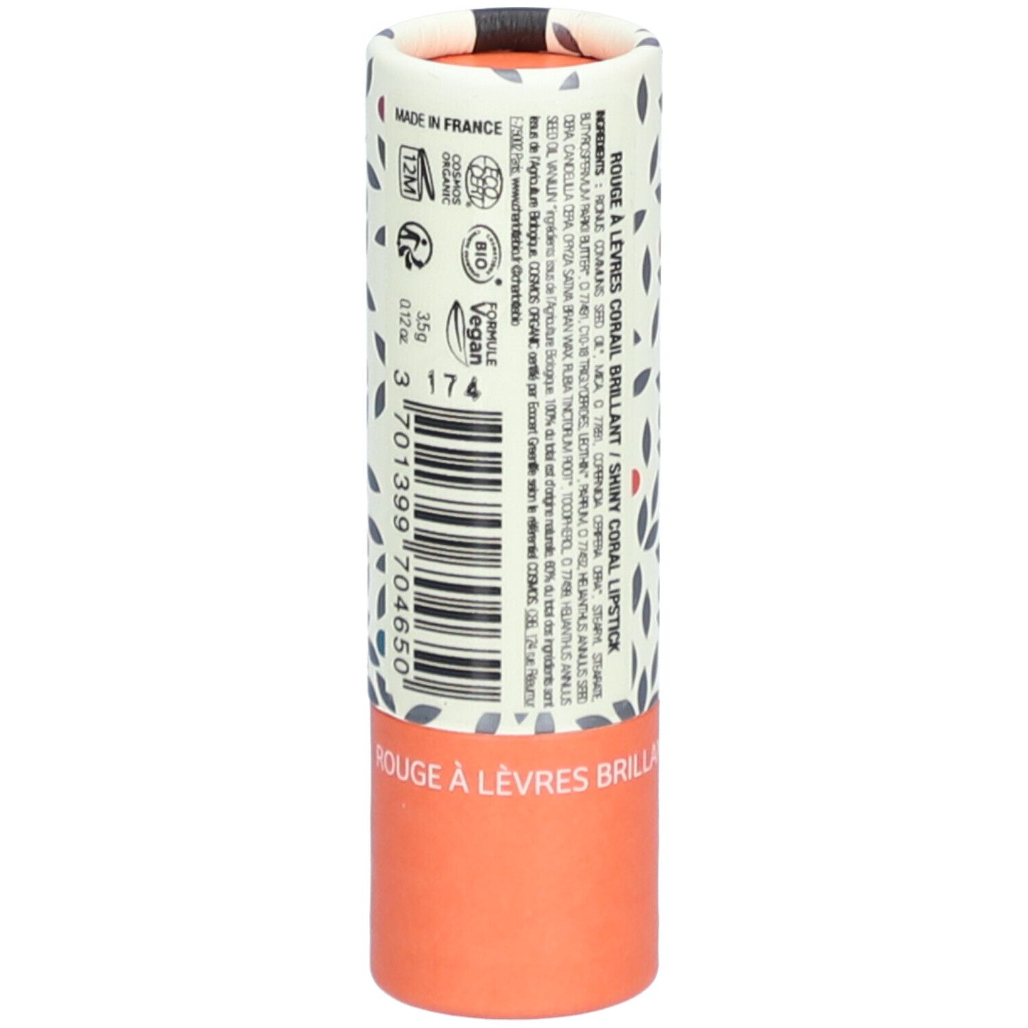 Lippenstift-Verpackung. Zylindrisch, floral bedruckt. Text: Rouge à lèvres brillant, Shiny Coral Lipstick. Barcode, Vegan-Logo.