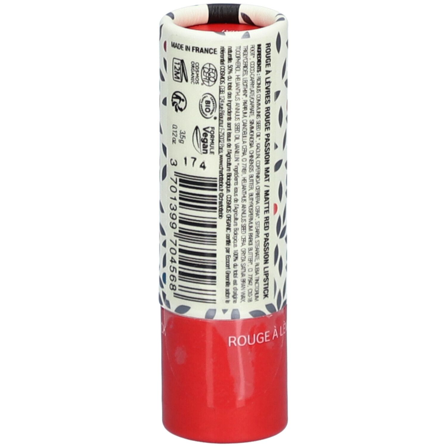 Zylindrische Verpackung mit floralem Muster, Text und Logos. Roter Boden, Text: ROUGE À LÈVRES. Vegan-Logo.