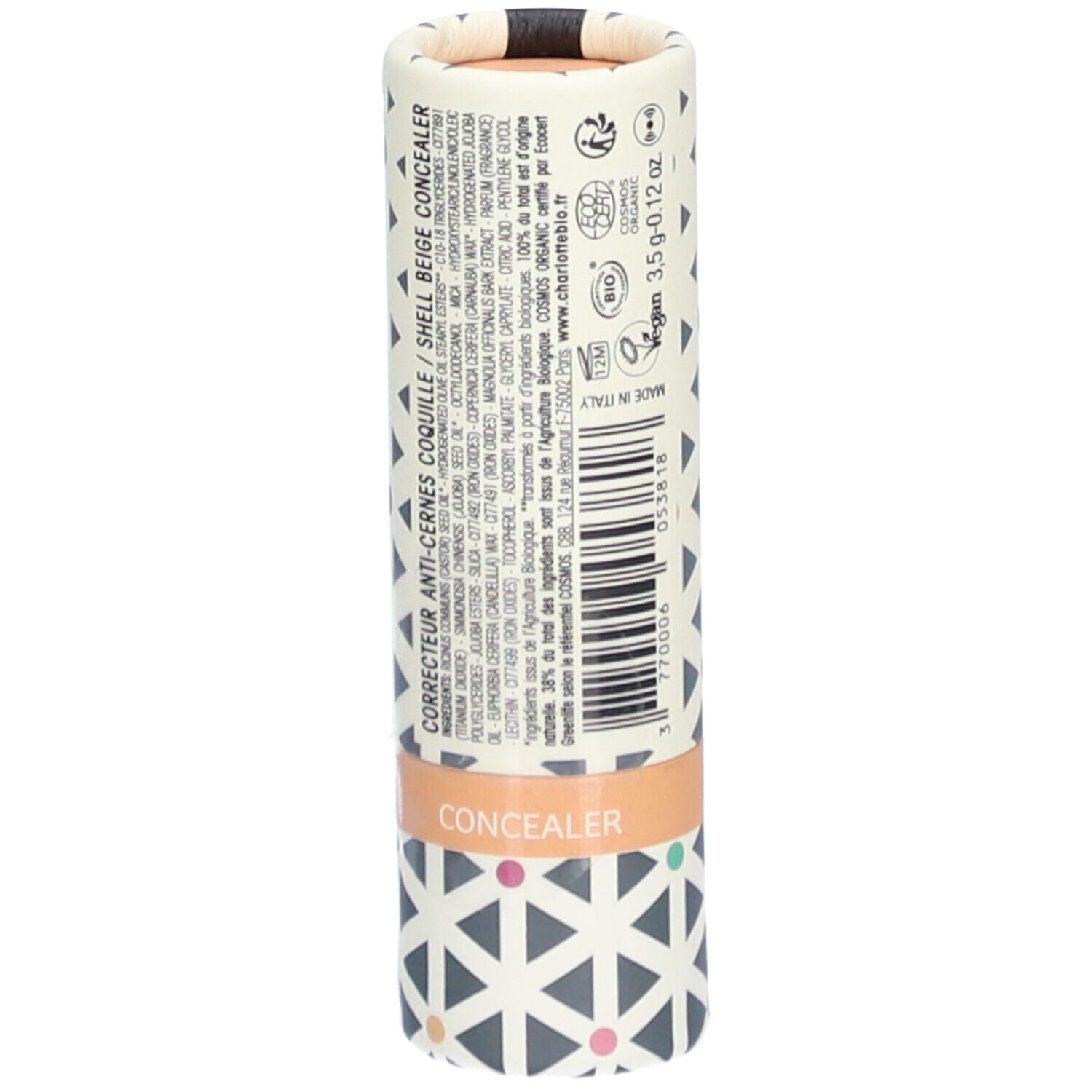 Emballage cylindrique avec motif géométrique. Ingrédients et texte CORRECTEUR ANTI-CERNES COQUILLE. Label Vegan. CONCEALER.
