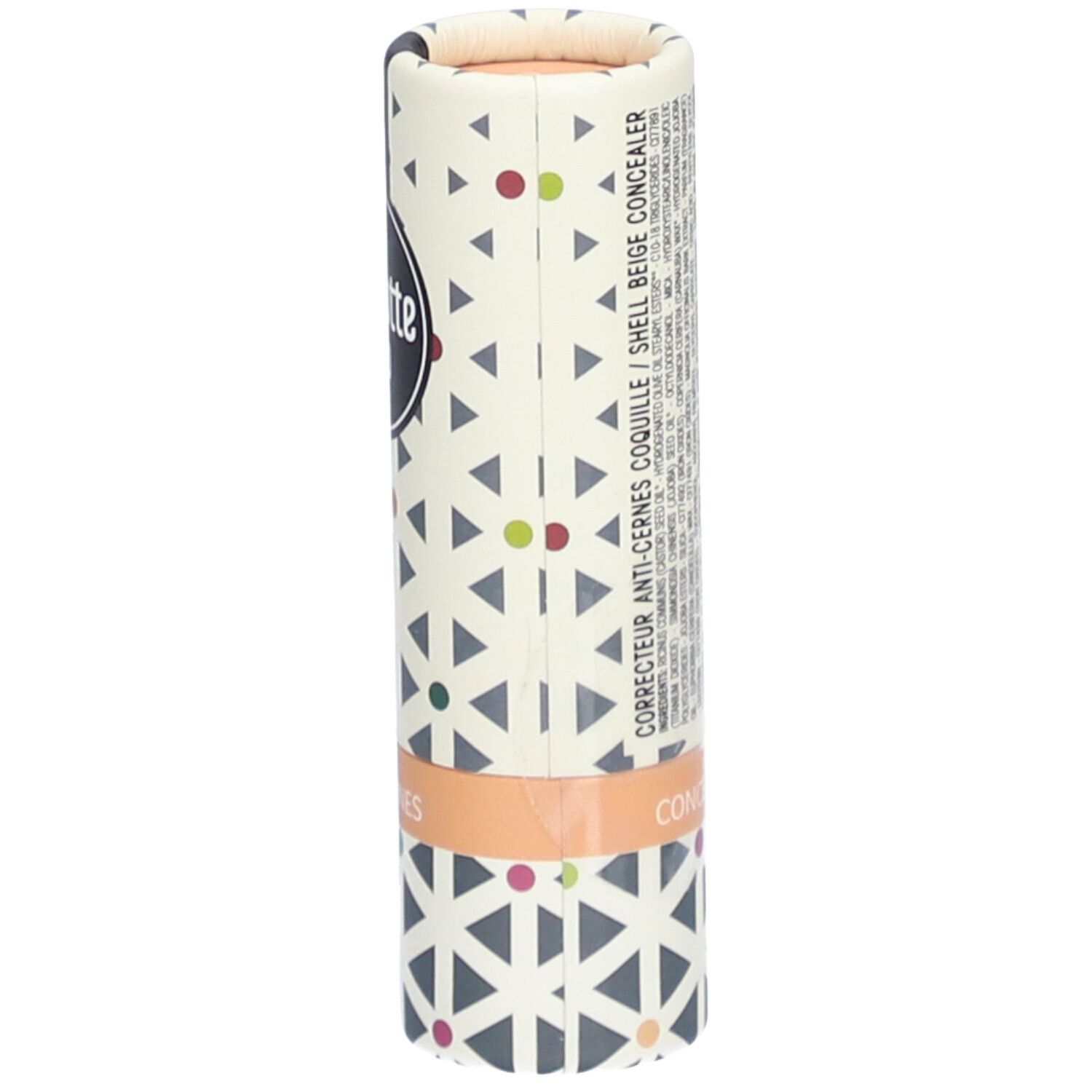 Emballage cylindrique avec motif géométrique. Texte CORRECTEUR ANTI-CERNES COQUILLE. Inscription CONCEALER sur bande beige.