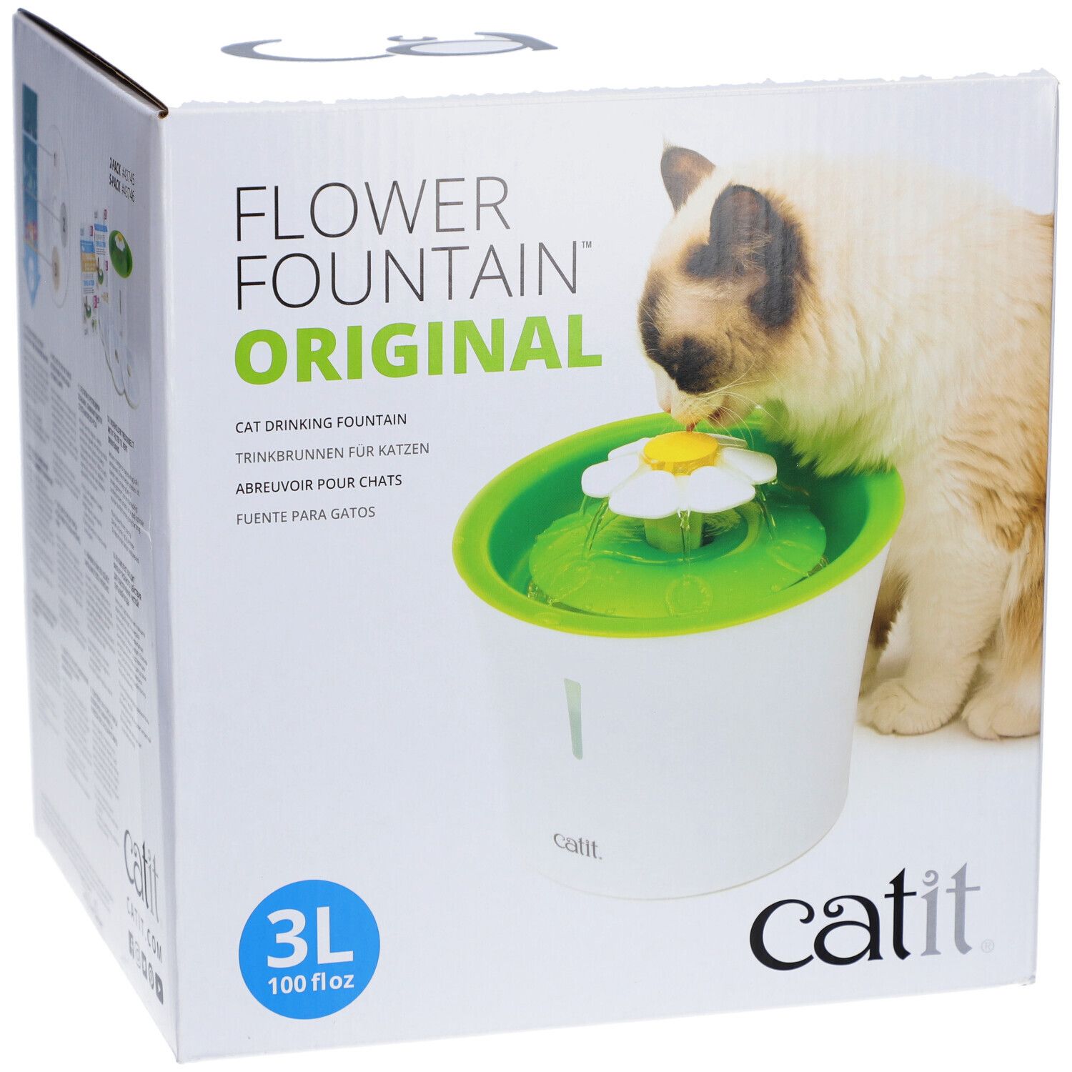 Verpackung der Catit Blumentrinkbrunnen. Ein Kätzchen trinkt aus dem Brunnen. Der Brunnen ist weiß und grün. Auf der Verpackung steht "Flower Fountain Original".
