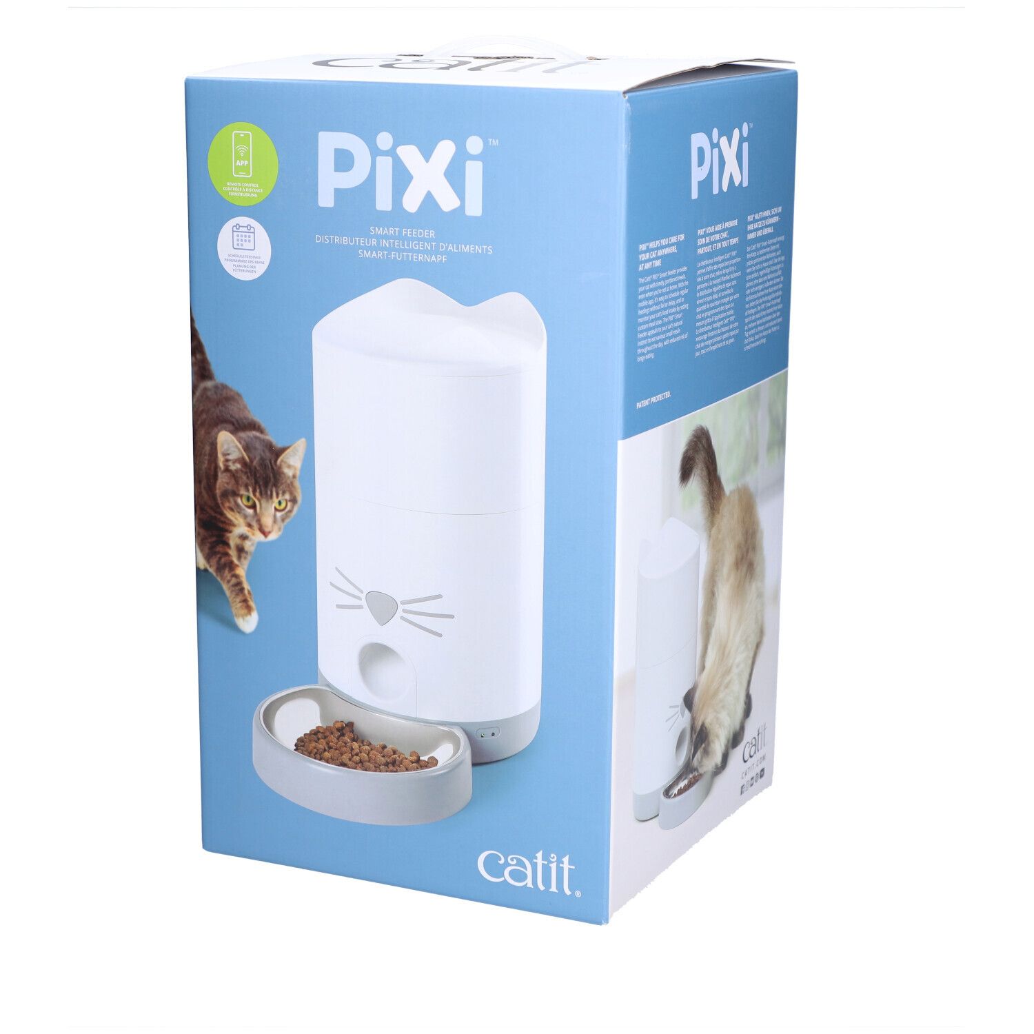 Verpackung des Catit PIXI Smart-Futterautomaten. Weißer Futterautomat mit Katzengesicht-Design, Futter in Schale. Marke Catit.