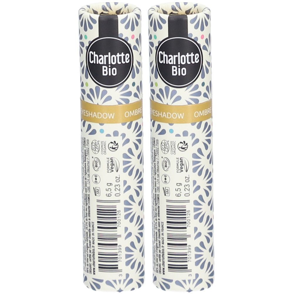 Zwei zylindrische Verpackungen mit floralem Muster. Aufschrift: Charlotte Bio. Enthält Lidschatten. Vegan. 6,5 g.