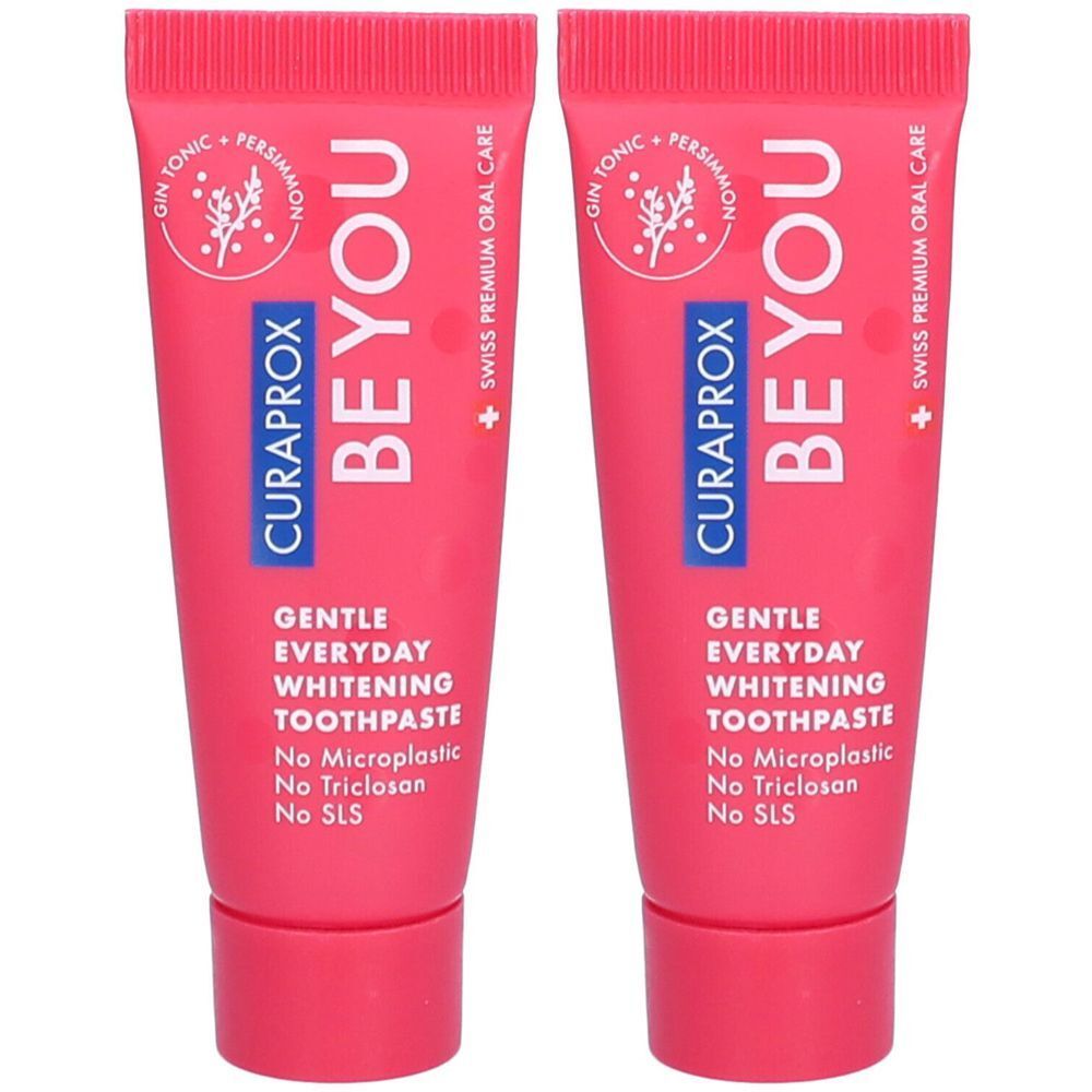 Zwei Tuben Zahnpasta in Rosa. Aufschrift: BEYOU, CURAPROX, GENTLE EVERYDAY WHITENING TOOTHPASTE. Ohne Mikroplastik, Triclosan und SLS.