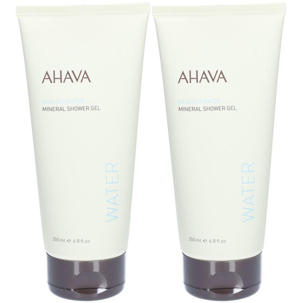 Deux tubes de gel douche minéral AHAVA. Tubes blanc cassé avec bouchons marron. Logo AHAVA et nom du produit.