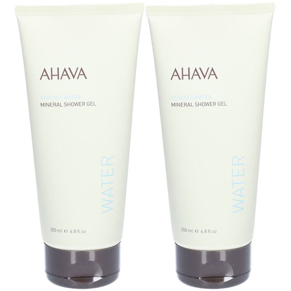Deux tubes de gel douche minéral AHAVA. Tubes blanc cassé avec bouchons marron. Logo AHAVA et nom du produit.