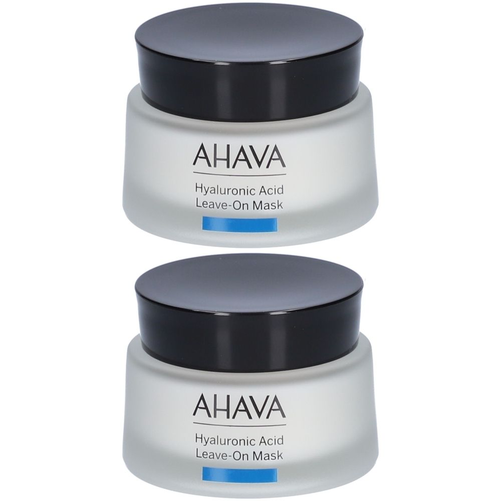 Deux pots AHAVA Hyaluronic Acid Leave-On Mask. Pots blancs avec couvercles noirs. Ligne bleue.