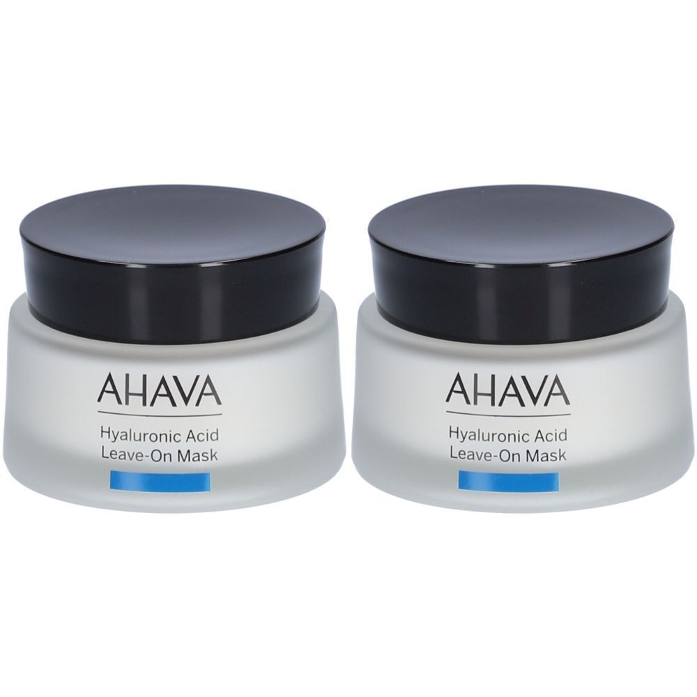 Deux pots AHAVA Hyaluronic Acid Leave-On Mask. Pots blancs avec couvercles noirs. Ligne bleue.