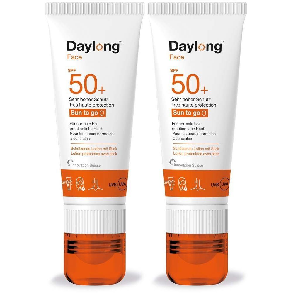 Zwei Tuben Daylong Face SPF 50+ Sonnenlotion. Weiße Tuben mit orangefarbenem Boden. Text: Sehr hoher Schutz, Sun to go.