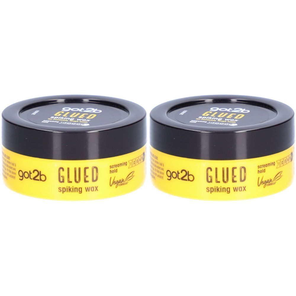 Zwei Tiegel Spiking Wax. Schwarzer Deckel, gelber Behälter. Aufschrift: got2b GLUED spiking wax. Vegan.