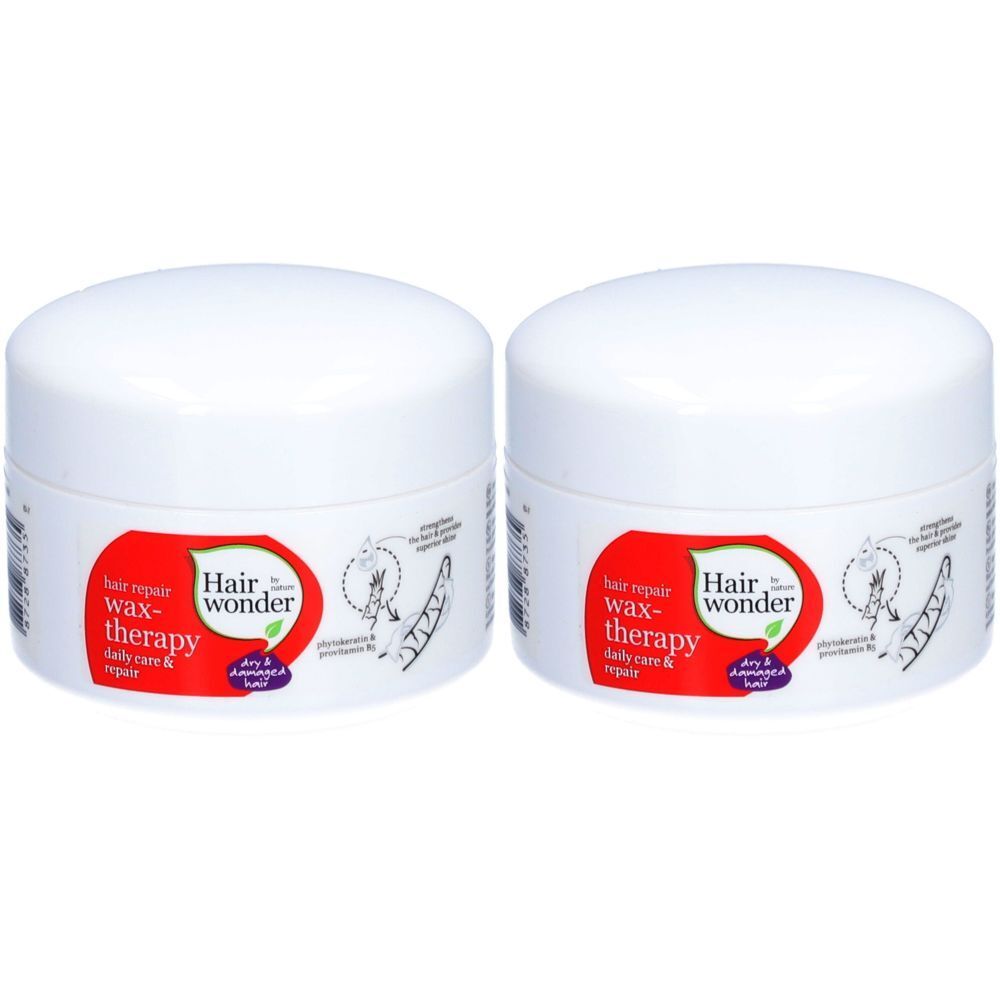 Deux pots blancs avec une étiquette rouge. L'étiquette indique "Hairwonder wax-therapy".