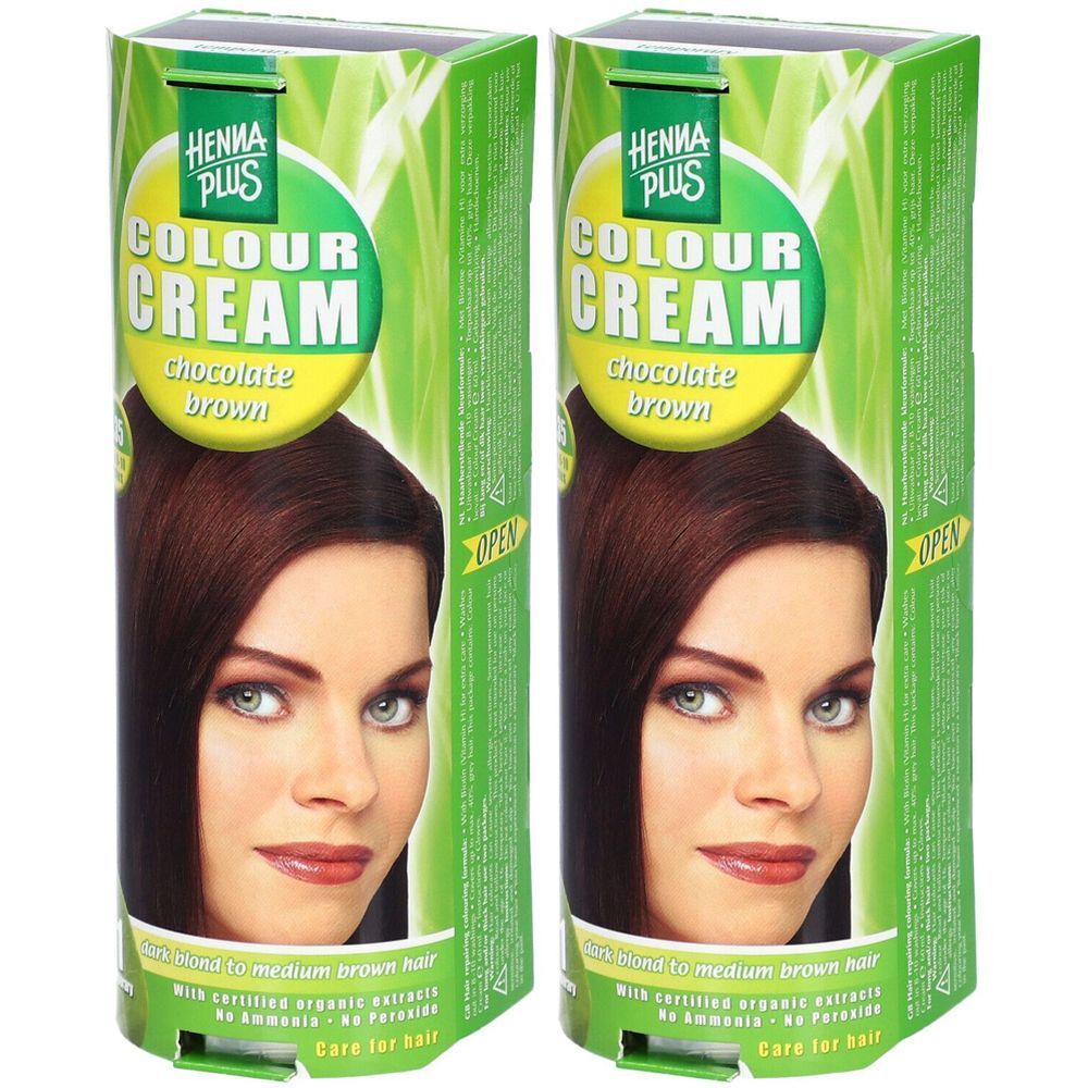 Deux boîtes de coloration capillaire. Sur l'emballage, on lit HENNA PLUS COLOUR CREAM, chocolat brun. Un portrait de femme est affiché.