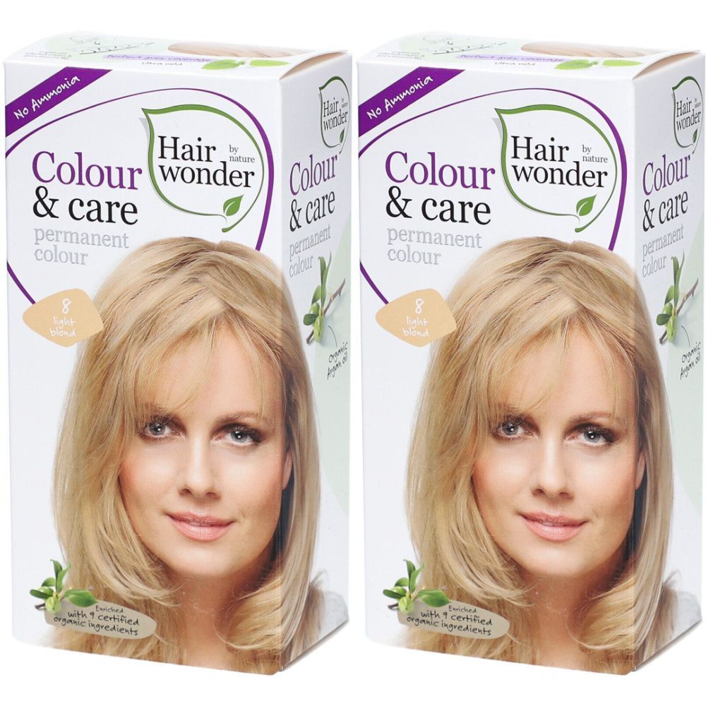 Zwei Packungen Haarfarbe. Auf der Verpackung ist eine Frau mit blondem Haar abgebildet. Text: Colour & care, permanent colour, Hair wonder.