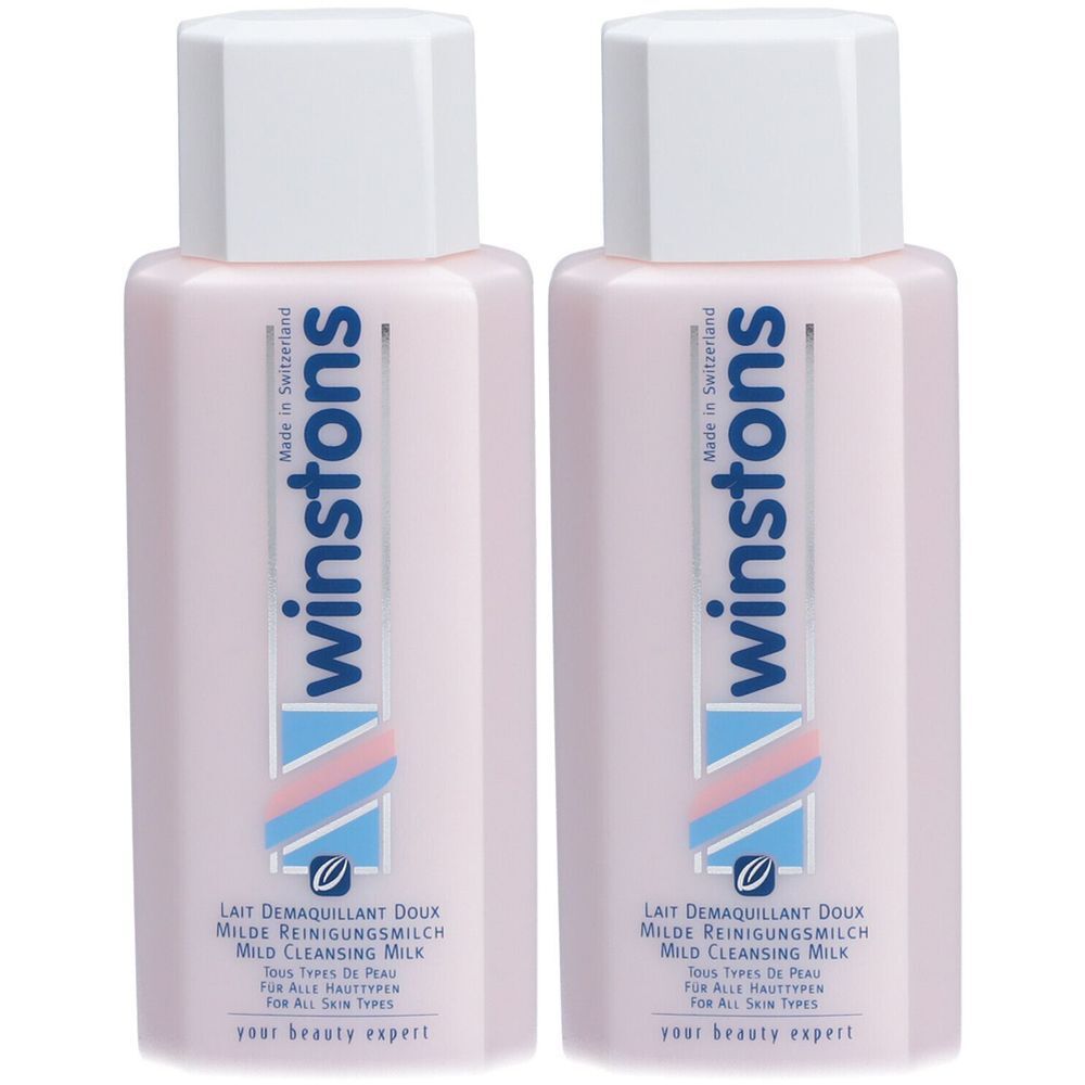 Zwei Flaschen Winstons Reinigungsmilch. Rosa Flaschen mit weißem Deckel. Text: Lait Demaquillant Doux, Milde Reinigungsmilch, Mild Cleansing Milk.