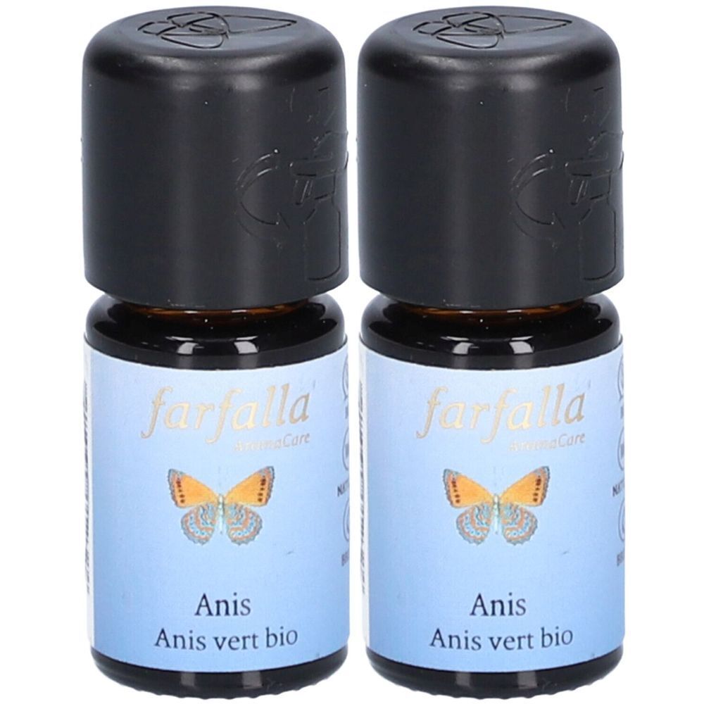 Deux flacons en verre brun avec bouchons noirs. Étiquettes bleues avec "farfalla", un papillon et "Anis Anis vert bio".