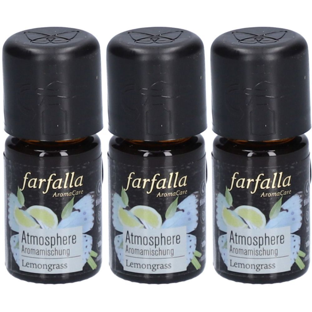 Drie flesjes met zwarte doppen. De etiketten tonen "farfalla", "Atmosphere Aromamischung" en "Lemongrass".