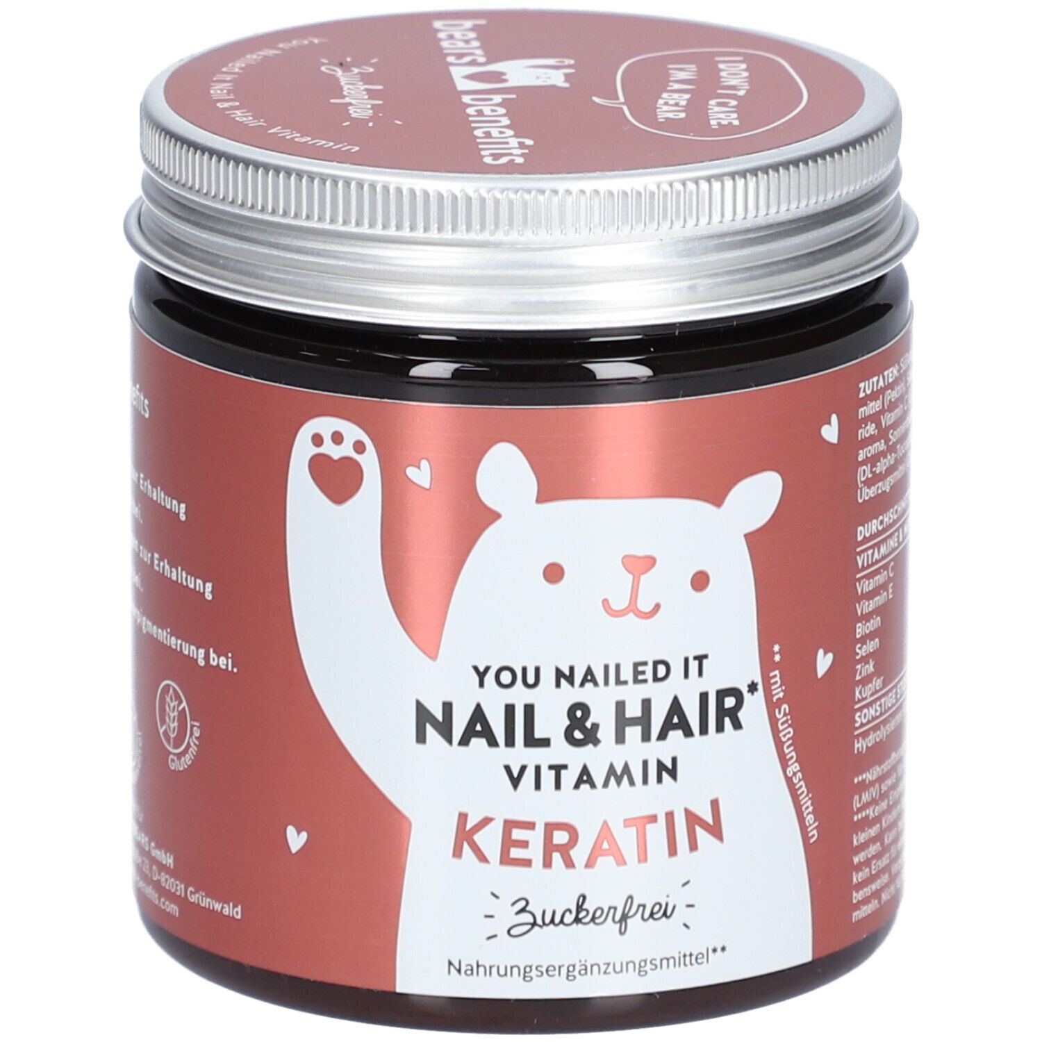 Braune Dose mit Schraubverschluss. Aufschrift: YOU NAILED IT NAIL & HAIR VITAMIN KERATIN. Zuckerfrei. Bär-Illustration.