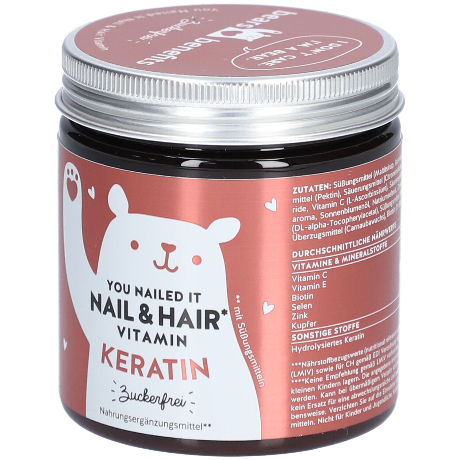 Braune Dose mit Schraubverschluss. Aufschrift: YOU NAILED IT NAIL & HAIR VITAMIN KERATIN. Zuckerfrei. Bär-Illustration.