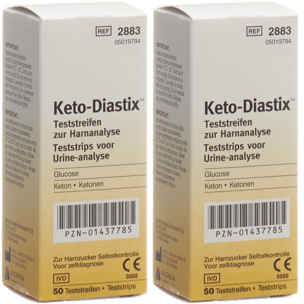 Zwei Kartons Keto-Diastix Teststreifen. Aufschrift: Teststreifen zur Harnanalyse, Glucose, Keton. Mit CE-Kennzeichnung und 50 Teststreifen.