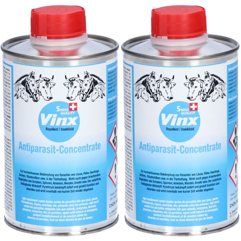 Zwei Metallbehälter mit rotem Deckel. Aufschrift: Vinx Antiparasit-Concentrate. Abbildung von Kühen. Schweizer Kreuz.